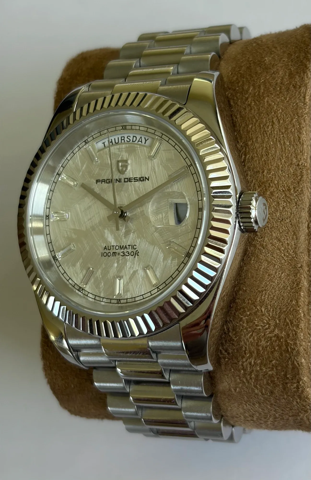 The PD-1783 from a three-quarter angle, showing the fluted bezel and crown.